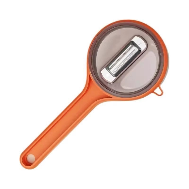 Eplucheur de fruits et légumes avec boîte de rangement